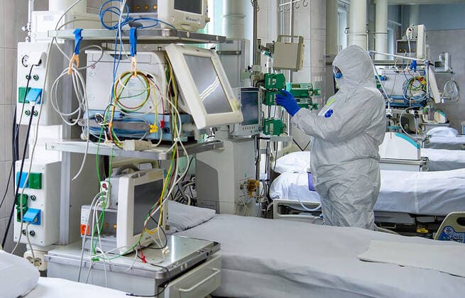 MOSCOW, RUSSIA - APRIL 13, 2020: A medical worker in protective gear during the opening of a coronavirus treatment facility at City Hospital 31 in Lobachevskogo Street. The hospital is equipped with 620 beds and 72 intensive care beds. Denis Grishkin Press Office of the Moscow Mayor and Moscow Government TASS  TS0D58E8