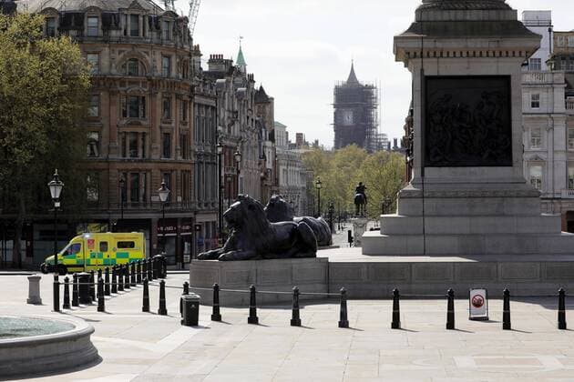 (200413) -- LONDON, April 13, 2020 (Xinhua) -- An ambulance drives through Trafalgar Square in London, Britain, April 13, 2020. The death toll of those hospitalized in Britain who tested positive for the novel coronavirus reached 10,612 as of Saturday afternoon, the Department of Health and Social Care said Sunday. (Photo by Tim Ireland Xinhua) BRITAIN-LONDON-COVID-19-DEATH TOLL 