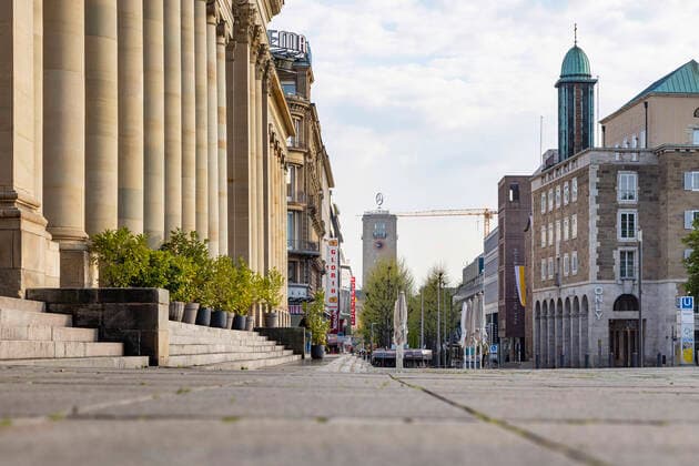 DEU, Germany, Baden Württemberg, Stuttgart, 13 04 2020 Shut down in Stuttgart The corona virus is paralysing the state capital streets and squares are deserted pedestrian zone Königstrasse with Königsbau and station tower