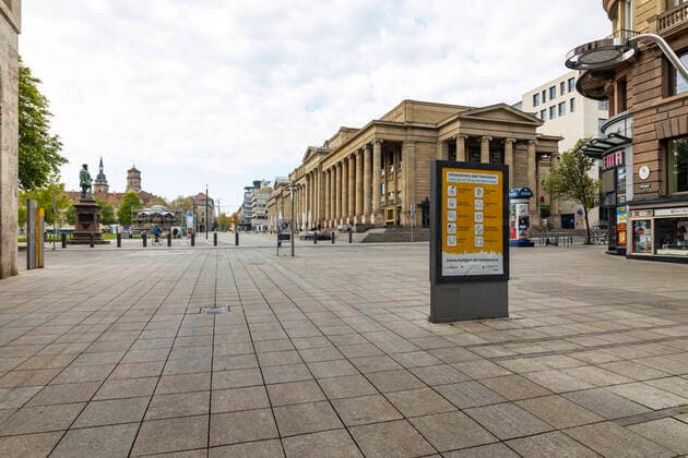 DEU, Germany, Baden Württemberg, Stuttgart, 13 04 2020 Shut down in Stuttgart The corona virus is paralysing the state capital streets and squares are deserted pedestrian zone Königstraße with Königsbau On the left the two towers of the Stiftskirche