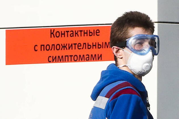MOSCOW, RUSSIA - APRIL 13, 2020: A paramedic in protective gear at the Novomoskovsky multipurpose medical center for patients with suspected COVID-19 coronavirus infection. Valery Sharifulin TASS  TS0D5933