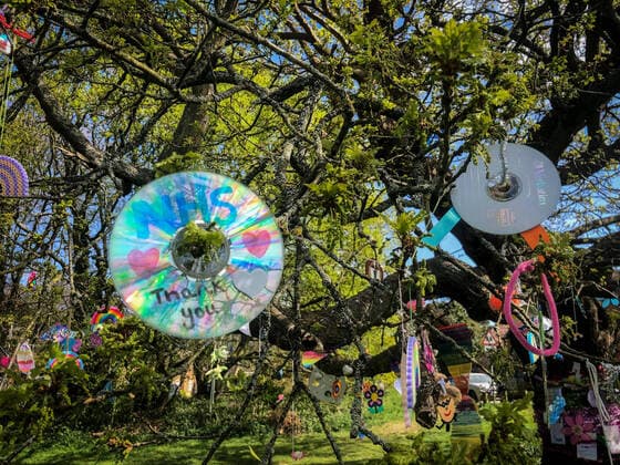 A tree is decorated by local residents in a village with positive messages and thank you to the NHS during Easter bank holiday Monday during the Covid-19 Pandemic as the UK Government advice to maintain social distancing and minimise time outside in High Wycombe on 13 April 2020. Copyright: xAndyxRowlandx PMI-3461-0006
