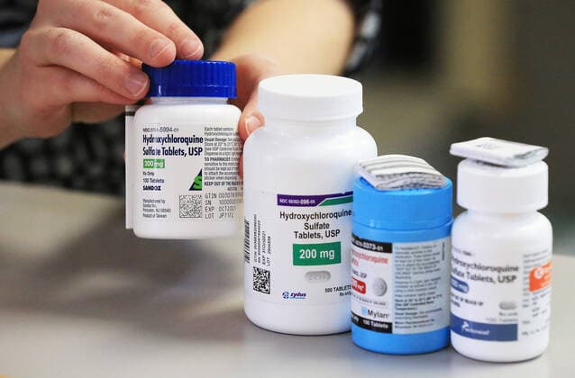 April 13, 2020, Davenport, Iowa, USA: A Pharmacist shows the variety of manufacturers providing Hydroxychloroquine Sulfate at Amicare Pharmacy on Utica Ridge Road in Bettendorf, Iowa Monday, April 13, 2020. Davenport USA - ZUMAq30_ 20200413_zaf_q30_007 Copyright: xKevinxE.xSchmidtx