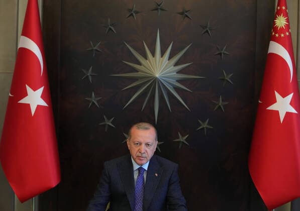 (200413) -- ISTANBUL, April 13, 2020 (Xinhua) -- Turkish President Recep Tayyip Erdogan delivers a speech after attending a cabinet meeting via teleconference in Istanbul, Turkey, on April 13, 2020. Erdogan on Monday announced a new two-day curfew which would be put into effect on April 17 to curb the spread of COVID-19. (Photo by Mustafa Kaya Xinhua) TURKEY-ISTANBUL-PRESIDENT-SPEECH-NEW CURFEW 