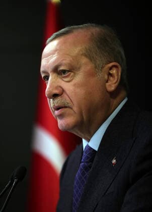 (200413) -- ISTANBUL, April 13, 2020 (Xinhua) -- Turkish President Recep Tayyip Erdogan delivers a speech after attending a cabinet meeting via teleconference in Istanbul, Turkey, on April 13, 2020. Erdogan on Monday announced a new two-day curfew which would be put into effect on April 17 to curb the spread of COVID-19. (Photo by Mustafa Kaya Xinhua) TURKEY-ISTANBUL-PRESIDENT-SPEECH-NEW CURFEW 