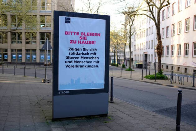 CORONA PANDEMIE,CORONAVIRUS,COVID 19,poster,Please stay at home,photographed on 13 04 2020 in the city of Essen in the Ruhr area in the federal state of North Rhine-Westphalia NRW Â