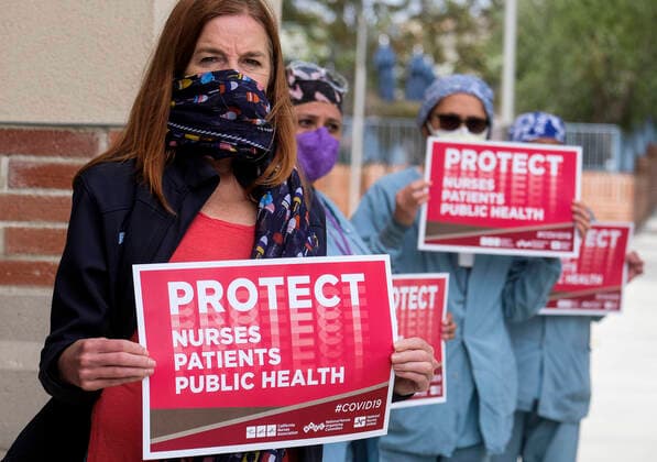 April 13, 2020, Los Angeles, California, U.S: Nurses and healthcare workers in a protest for the lack of personal protective equipment at UCLA Medical Center in Santa Monica, California, Monday April 13, 2020. Los Angeles U.S. - ZUMAc68_ 20200413_zaf_c68_008 Copyright: xRingoxChiux