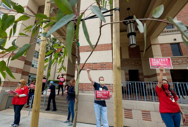 April 13, 2020, Los Angeles, California, U.S: Nurses and healthcare workers in a protest for the lack of personal protective equipment at UCLA Medical Center in Santa Monica, California, Monday April 13, 2020. Los Angeles U.S. - ZUMAc68_ 20200413_zaf_c68_010 Copyright: xRingoxChiux