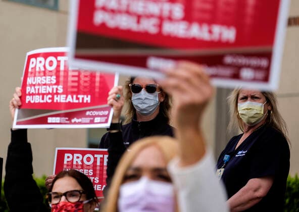 April 13, 2020, Los Angeles, California, U.S: Nurses and healthcare workers in a protest for the lack of personal protective equipment at UCLA Medical Center in Santa Monica, California, Monday April 13, 2020. Los Angeles U.S. - ZUMAc68_ 20200413_zaf_c68_012 Copyright: xRingoxChiux