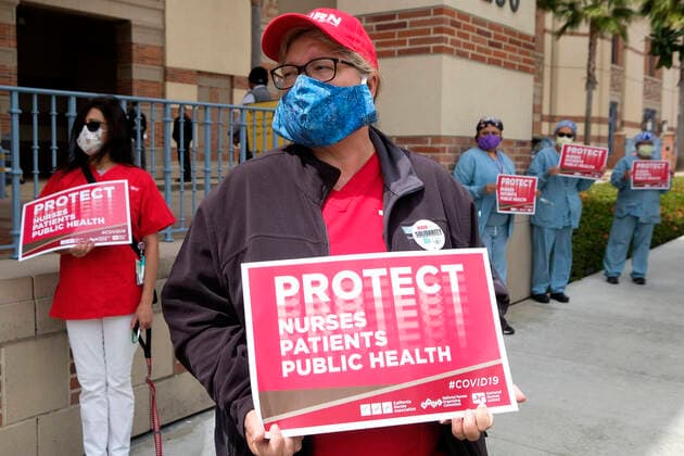 April 13, 2020, Los Angeles, California, U.S: Nurses and healthcare workers in a protest for the lack of personal protective equipment at UCLA Medical Center in Santa Monica, California, Monday April 13, 2020. Los Angeles U.S. - ZUMAc68_ 20200413_zaf_c68_022 Copyright: xRingoxChiux