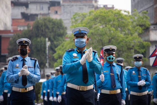 Nepal: Traffic police join a nationwide campaign Traffic Police officers show their solidarity by clapping at the end of the National Anthem to show their appreciation and respect for the doctors, nurses, delivery workers, cleaners, and everyone else for keeping Nepal safe and stocked on this time of global health crisis caused by COVID 19 to mark the Nepali New Year 2077 in Kathmandu, Nepal on April 13 , 2020. The country is on the third week of natonwide lockdown. Kathmandu Bagmati Nepal Copyright: SubashxShrestha