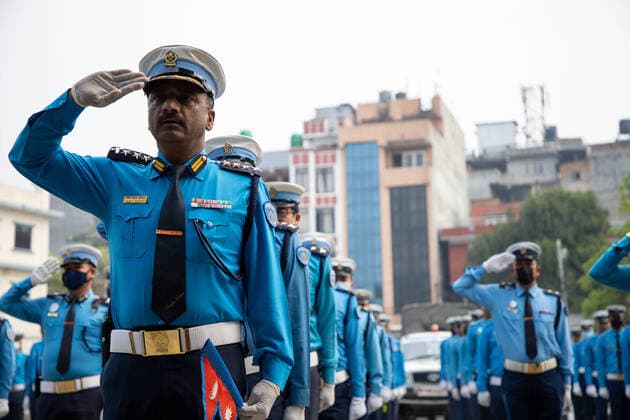 Nepal: Traffic police join a nationwide campaign Traffic Police officers join the country and play National Anthem from their work place to salute all the people on the front line: doctors, nurses delivery workers, cleaners, supermarket staffs and everyone else for keeping Nepal safe and stocked on this of global health crisis by COVID 19 to mark the Nepali New Year 2077 in Kathmandu Nepal, April 13, 2020. The country is on the third week of natonwide lockdown. Kathmandu Bagmati Nepal Copyright: SubashxShrestha