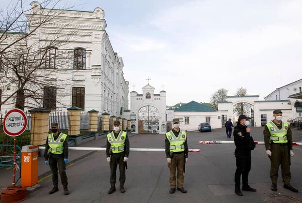 April 13, 2020, Kiev, Ukraine: National Guard soldiers the block entrance to Kyiv Pechersk Lavra in Kiev..Kyiv Pechersk Lavra shutdown for quarantine as the COVID-19 coronavirus hotbed. On 13 April 2020 Kyiv Mayor Vitaliy Klitschko has declared that the COVID-19 confirmed cases at the Kyiv Pechersk Lavra jumped to more than 90, including 63 cases confirmed over the past day. The Kyiv Pechersk Lavra, which is one the most important Orthodox shrines, since its foundation as the cave monastery in 1051, the Lavra has been a preeminent center of Eastern Orthodox Christianity in Eastern Europe. Kiev Ukraine - ZUMAs197 20200413_zaa_s197_194 Copyright: xPavloxGoncharx