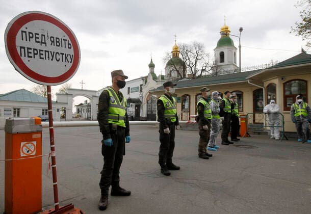 April 13, 2020, Kiev, Ukraine: National Guard soldiers block the entrance to Kyiv Pechersk Lavra in Kiev..Kyiv Pechersk Lavra shutdown for quarantine as the COVID-19 coronavirus hotbed. On 13 April 2020 Kyiv Mayor Vitaliy Klitschko has declared that the COVID-19 confirmed cases at the Kyiv Pechersk Lavra jumped to more than 90, including 63 cases confirmed over the past day. The Kyiv Pechersk Lavra, which is one the most important Orthodox shrines, since its foundation as the cave monastery in 1051, the Lavra has been a preeminent center of Eastern Orthodox Christianity in Eastern Europe. Kiev Ukraine - ZUMAs197 20200413_zaa_s197_201 Copyright: xPavloxGoncharx