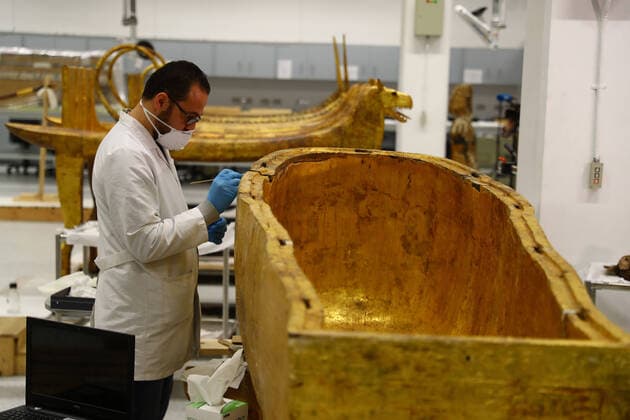 (200413) -- GIZA (EGYPT), April 13, 2020 (Xinhua) -- An archeologist wearing a face mask works in the Grand Egyptian Museum (GEM) in Giza, Egypt, on April 13, 2020. Egypt reported on Monday 125 new COVID-19 infections and five deaths, bringing the death toll in the country to 164, while the number of the confirmed cases jumped to 2,190. (Xinhua Ahmed Gomaa) EGYPT-GIZA-GRAND EGYPTIAN MUSEUM-COVID-19-MEASURES 