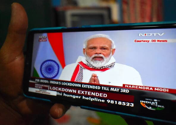 India: COVID-19 lockdown extended to May 3, 2020 People are showing Narendra Modi s Speech on their mobile in Kolkata, India. India’s Covid-19 lockdown has been extended until May 3, Prime Minister Narendra Modi said in an address to the nation. The initial 21-day lockdown was due to end on Tuesday. Modi explained that the lockdown, as well as other social distancing measures, have benefited the country despite the economic costs incurred. Kolkata West Bengal India Copyright: SudiptaxDas