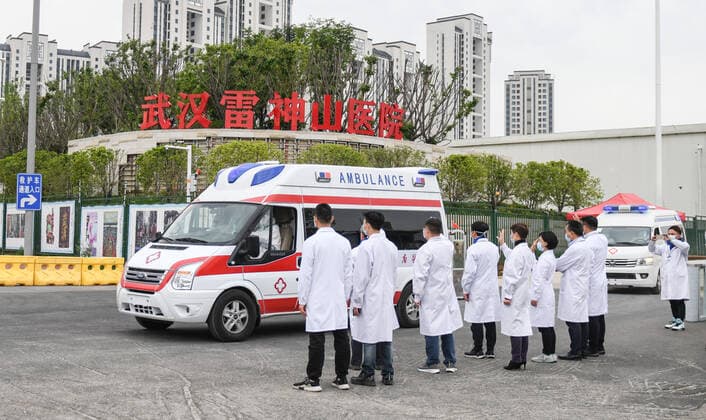 (200414) -- WUHAN, April 14, 2020 -- Ambulances, transferring the last batch of COVID-19 patients to other hospitals, leave Leishenshan (Thunder God Mountain) Hospital in Wuhan, central China s Hubei Province, April 14, 2020. ) CHINA-WUHAN-COVID-19-LEISHENSHAN HOSPITAL-PATIENTS-TRANSFER (CN) ChengxMin 