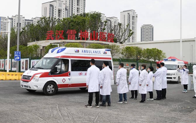 (200414) -- WUHAN, April 14, 2020 -- Ambulances, transferring the last batch of COVID-19 patients to other hospitals, leave Leishenshan (Thunder God Mountain) Hospital in Wuhan, central China s Hubei Province, April 14, 2020. ) CHINA-WUHAN-COVID-19-LEISHENSHAN HOSPITAL-PATIENTS-TRANSFER (CN) ChengxMin 