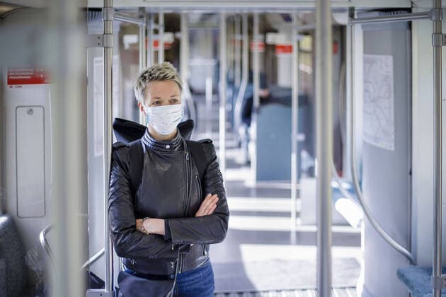 A woman is standing in a train of the Berlin public transport company She is wearing a face mask Berlin, 13 04 2020 Currently, Germany is considering relaxing the protective measures against the spread of the corona virus One option could be that passengers wear protective masks when using public transport Berlin Germany Copyright: xThomasxTrutschel photothekx