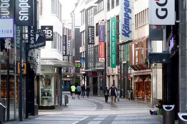 Nearly deserted shopping street and pedestrian zone Hohe Straße in downtown Cologne on Easter Monday, North Rhine-Westphalia, Germany