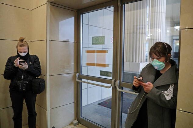 MOSCOW, RUSSIA - APRIL 14, 2020: Supporters of activist Konstantin Kotov ahead of a hearing of the appeal against his sentence to be reconsidered by the Moscow City Court; Kotov was sentenced to four years in prison in September 2019, on charges of multiple violations of rally regulations. Mikhail Tereshchenko TASS  TS0D59C2