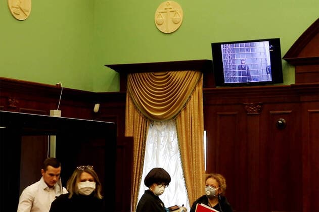 MOSCOW, RUSSIA - APRIL 14, 2020: A video screen grab shows participants in a hearing held at the Moscow City Court via video link with activist Konstantin Kotov to reconsider the appeal against his sentence; Kotov was sentenced to four years in prison in September 2019, on charges of multiple violations of rally regulations. Best quality available. Moscow City Court Press Office TASS  TS0D5A3B