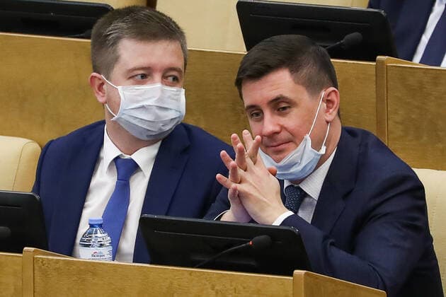 MOSCOW, RUSSIA - APRIL 14, 2020: Russian State Duma members wear face masks during a State Duma plenary meeting. Anton Novoderezhkin TASS  TS0D5A84