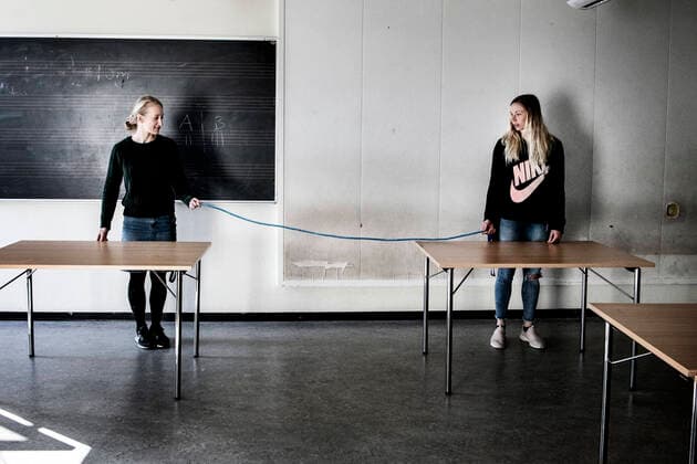 Kirstine Bestle and Sara Mandrup Nielsen, like the rest of their colleagues, are working hard to prepare for the reopening of the full-day school at Vejle, Tuesday, April 14, 2020 For the sake of clarity, the doctors have brought a rope of two meters into the classes, so they can easily check how far between the seats the school has been closed due to the risk of infection from coronavirus COVID 19, Vejle,  Copyright: MettexM MettexMoerkx cop111 spdk20200414-153254-L
