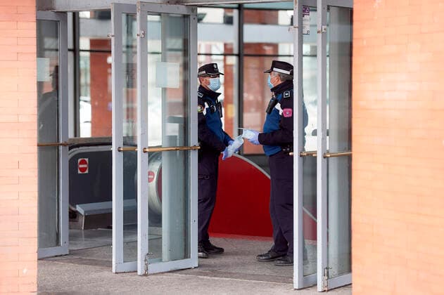 The Police of Madrid distributes masks at the Atocha station during the health crisis due to the Covid-19 virus pandemic - Coronaviruss. April 14,2020. (2020041430)