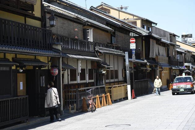KYOTO, JAPAN - APRIL 14: In this photo shows few people walking in famous tourist destination Gion in Kyoto on Tuesday, April 14, 2020, amid the spread of the new coronavirus. Japanese Prime Minister Shinzo Abe declared a state of emergency last week for Tokyo and six other prefectures including Kyoto to ramp up defenses against the spread of the coronavirus. (Photo: Richard Atrero de Guzman AFLO)  (125334843)