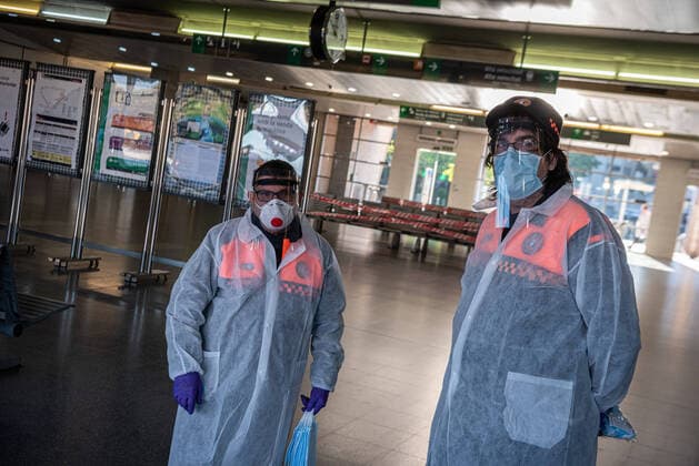 April 14, 2020, Girona, Spain: Members of Civic Agents Girona, ready to provide protection masks during the first day of work after the lift of the lock down restrictions..Some industries and construction sectors in Catalonia resume work as the lockdown restrictions have been changed. Health Ministry of Spain has so far recorded a total of 170,099 infections, 17,756 death and 64,727 recovered since the beginning of the corona virus outbreak. Girona Spain - ZUMAs197 20200414_zaa_s197_060 Copyright: xAdriÃ xSalidoxZarcox