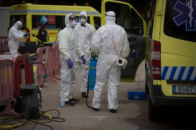 Coronavirus Outbreak COVID 19 Firefighters sterilize the ambulances and the drivers after the transport of patients at the temporary field hospital for coronavirus patients installed at the IFEMA Fairgrounds of Madrid to unload the saturation on hospitals because to the COVID 19 pandemic Photo by Jose Cuesta 261 Cordon Press Cordon Press  JosexCuesta