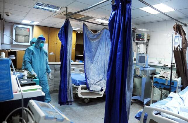 (200414) -- DAMASCUS, April 14, 2020 -- Medical workers are seen in an isolation unit at the Mujtahid hospital in Damascus, capital of Syria, on April 14, 2020. Four new COVID-19 cases were reported in Syria on Tuesday, bringing the overall number of registered cases to 29, the health ministry said in a statement. (Photo by Xinhua) SYRIA-DAMASCUS-COVID19-HOSPITAL AmmarxSafarjalani 