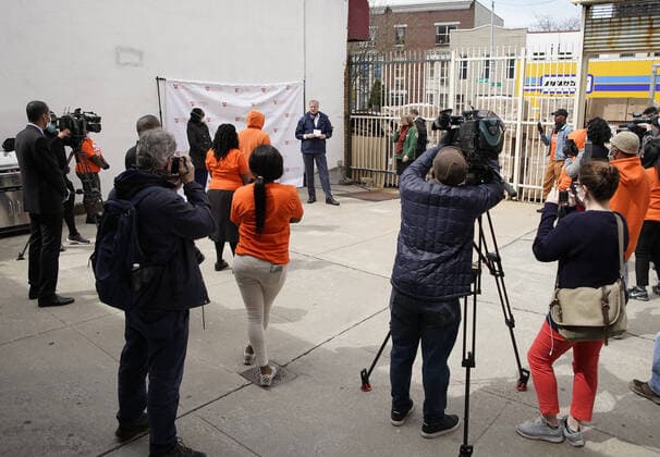 New York Mayor Bill de Blasio speaks to workers when he visits The Campaign Against Hunger food pantry in New York City on Tuesday, April 14, 2020. As of today nearly 285,000 have been infected and more than 14,000 people have died in NY, NJ and CT. There are signs however that the curve is flattening.  NYP20200414103 JOHNxANGELILLO