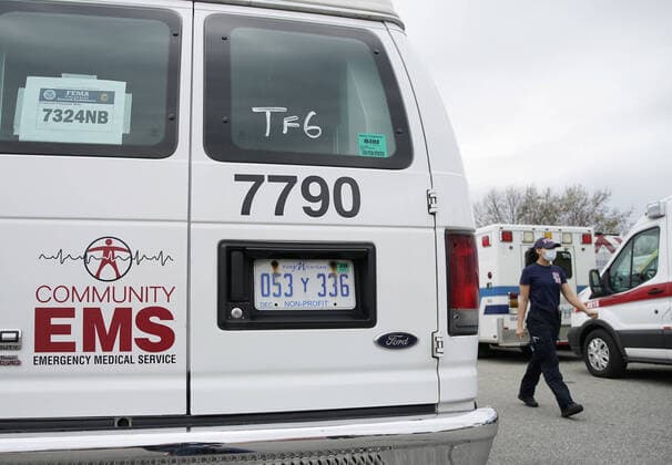 Paramedics and EMT healthcare workers from around the country assemble for a meeting among a large group of ambulances at Fort Totten Park in Queens in New York City on Tuesday, April 14, 2020. As of today nearly 285,000 have been infected with Coronavirus and more than 14,000 people have died in NY, NJ and CT. There are signs however that the curve is flattening.  NYP20200414110 JOHNxANGELILLO