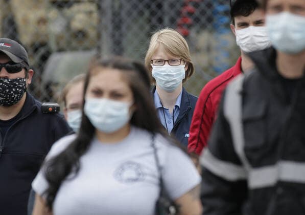 Paramedics and EMT healthcare workers from around the country assemble for a meeting among a large group of ambulances at Fort Totten Park in Queens in New York City on Tuesday, April 14, 2020. As of today nearly 285,000 have been infected with Coronavirus and more than 14,000 people have died in NY, NJ and CT. There are signs however that the curve is flattening.  NYP20200414129 JOHNxANGELILLO
