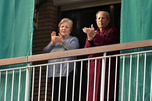 April 14, 2020, LÂ Hospitalet, Barcelona, Spain: People applaud Covid-19 fighters from their terrace during confinement. Citizens of LÂ Hospitalet at 8:00 pm continue to applaud showing gratitude to the people who are struggling in the fight against the Covid-19 health crisis, they give each other hope. LÂ Hospitalet Spain - ZUMAs197 20200414_zaa_s197_123 Copyright: xRamonxCostax