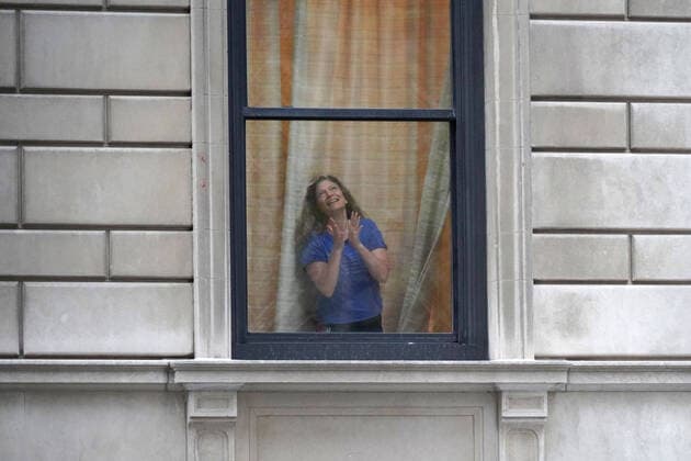April 14, 2020, New York, New York, USA: Nightly cheering for frontline workers,.Upper West Side, NYC.April 14, 2020.Photos by Sonia Moskowitz. New York USA - ZUMAm334 20200414_zep_m334_014 Copyright: xSoniaxMoskowitzxGordonx