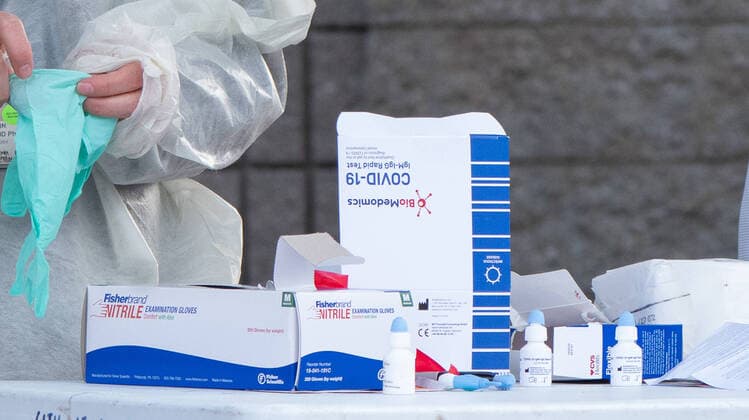 April 14, 2020, Chelsea, Massachusetts,USA: The BioMedomics Rapid IgM-IgG Combined Antibody Test for COVID-19 at rapid blood fingerstick study site. The study, study is sponsored by Partners Health Care, not-for-profit health care system, is to measure the prevalence of COVID-19 in Chelase, Massacusetts. Chelsea leaders said on March 9, that Chelsea currently has a higher rate of infection than New York City. More than 60% of residents of Chelsea are Latino, and almost half are immigrants. (125344558)