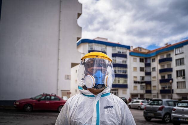 April 14, 2020, Ericeira, Portugal: An employee of the Ericeira parish council is equipped with the recommended protective materials..The municipality of Mafra had 70 cases of COVID-19 pandemic. In order to prevent the spread of the virus, the Ericeira Parish Council perform weekly street disinfection. Ericeira Portugal - ZUMAs197 20200414_zaa_s197_191 Copyright: xHenriquexCasinhasx