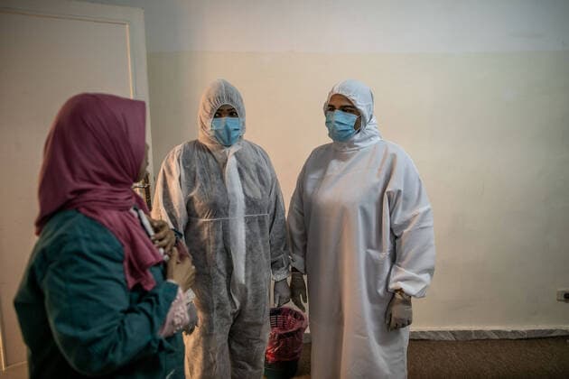 (200415) -- TRIPOLI, April 15, 2020 (Xinhua) -- Workers are seen in a fashion school which was turned into a workshop producing protective gears in Tripoli, Libya, on April 14, 2020. The Libyan National Center for Disease Control on Tuesday announced nine new COVID-19 cases, bringing the total number of confirmed cases in the country to 35. (Photo by Amru Salahuddien Xinhua) LIBYA-TRIPOLI-COVID-19-PROTECTIVE WORKSHOP 