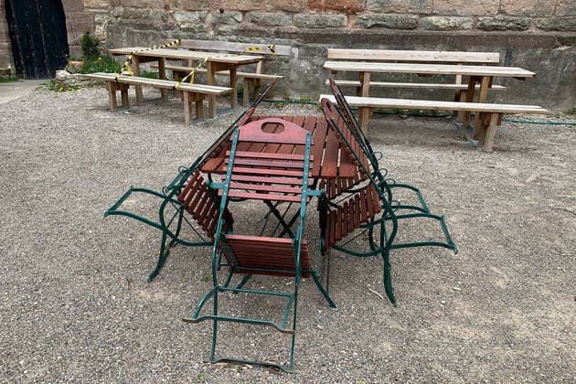 14 04 2020, Bovenden benches and chairs are standing at a restaurant at Plesse Castle Currently closed to contain the Coronavirus restaurant Bovenden Lower Saxony Germany