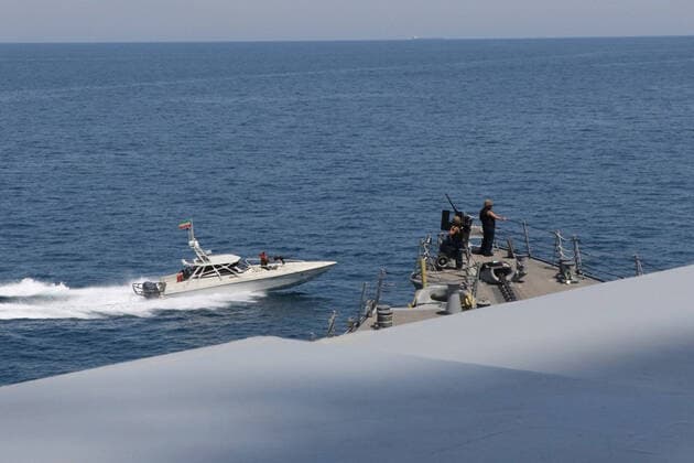 Iranian Islamic Revolutionary Guard Corps Navy (IRGCN) vessels conducted unsafe and unprofessional actions against U.S. Military ships by crossing the ships bows and sterns at close range while operating in international waters of the North Arabian Gulf on April 15, 2020. The guided-missile destroyer USS Paul Hamilton (DDG 60) is conducting joint interoperability operations in support of maritime security in the U.S. 5th Fleet area of operations.  WAX2020041501 U.S.xNAVY