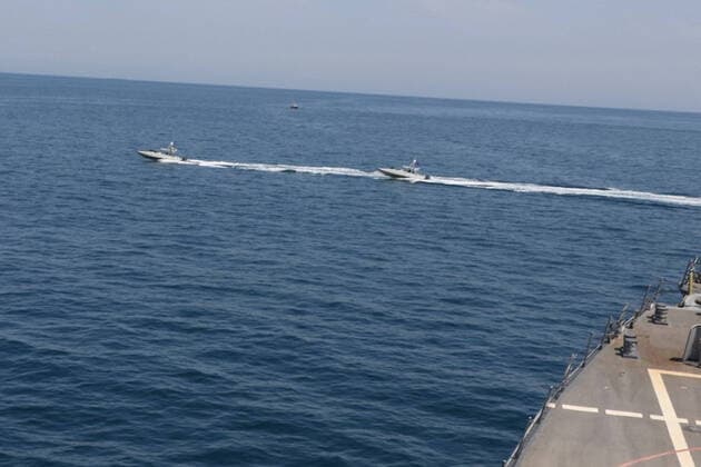 Iranian Islamic Revolutionary Guard Corps Navy (IRGCN) vessels conducted unsafe and unprofessional actions against U.S. Military ships by crossing the ships bows and sterns at close range while operating in international waters of the North Arabian Gulf on April 15, 2020. The guided-missile destroyer USS Paul Hamilton (DDG 60) is conducting joint interoperability operations in support of maritime security in the U.S. 5th Fleet area of operations.  WAX2020041502 U.S.xNAVY