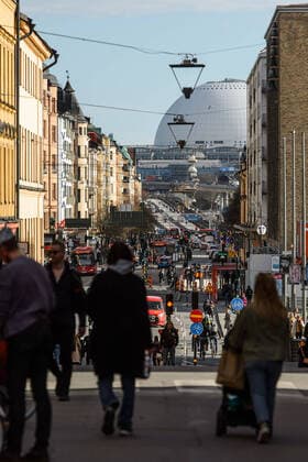 200415 People walking on Götgatan in front of Globen, as the coronavirus, COVID 19, outbreak continues on April 15, 2020 in Stockholm Sweden stands out among countries in the world with so far comparatively very few public restrictions during the coronavirus pandemic Photo Maxim ThorÃ BILDBYRAN kod MT,  Copyright: MAXIMxTHORE BB200415BB015