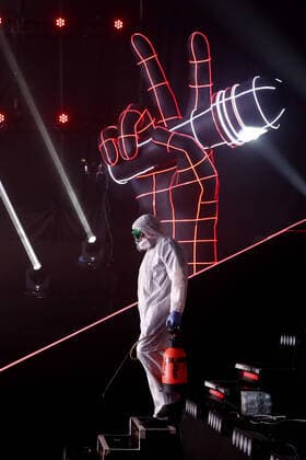 MOSCOW, RUSSIA - APRIL 16, 2020: A worker in a protective suit disinfecting the studio of The Voice Kids Russia reality TV singing competition ahead of a live broadcast scheduled for April 17; the shooting will be held without spectators and with the fewest possible members of the crew. Artyom Geodakyan TASS  TS0D60E7