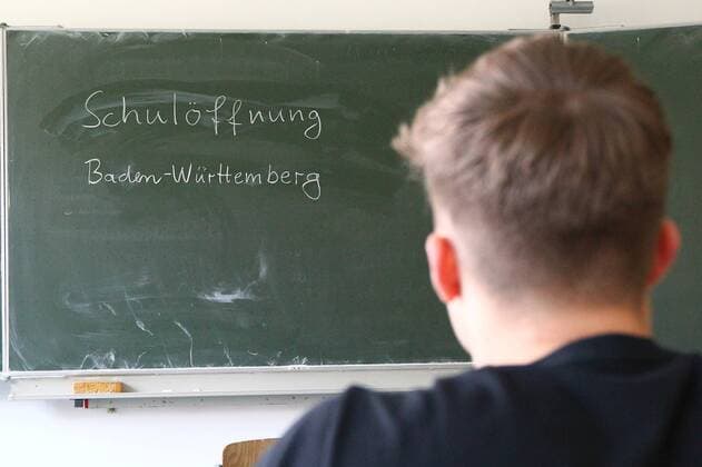 Diez School opening and closing in the corona crisis A pupil sits in front of a blackboard on which is written school opening Baden Wuerttemberg School opening and closing in the corona crisis Copyright: xWeissx Eibner-Pressefotox EP_rws