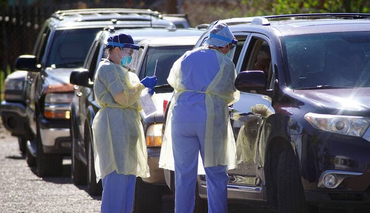 April 19, 2020, Albuquerque, NEW MEXICO, USA: 041920 ..Medical personnel performs a drive-thru Coronavirus Screening at Lovelace Hospital in Downtown Albuquerque l.Photographed on Sunday April 19, 2020.Adolphe Pierre-LouisJournal. Albuquerque USA - ZUMAab1_ 20200419_zaf_ab1_005 Copyright: xAlbuquerquexJournalx