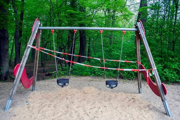 A playground in Cologne Dellbrück NRW Blocked playground due to contact ban because of the corona virus with flutterband
