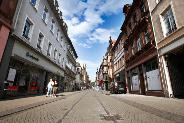 Nearly deserted shopping street and pedestrian zone Hauptstraße in the city centre Heidelberg, Baden Württemberg, Germany